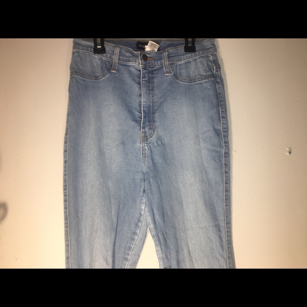 A pair of light blue fashion nova skinny jeans